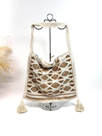 Sac fourre tout esprit voyage aux finitions brodées
