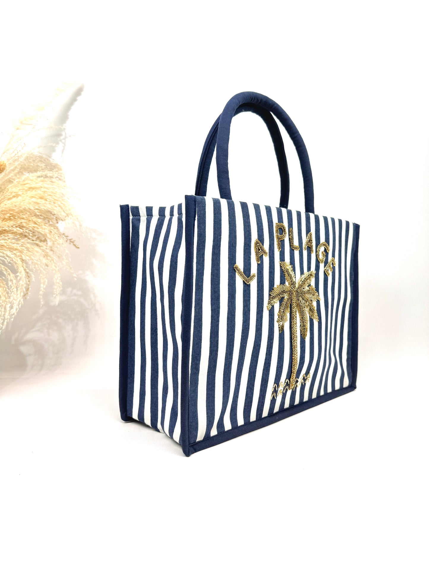 Le sac cabas "La plage" toile rayée et palmier