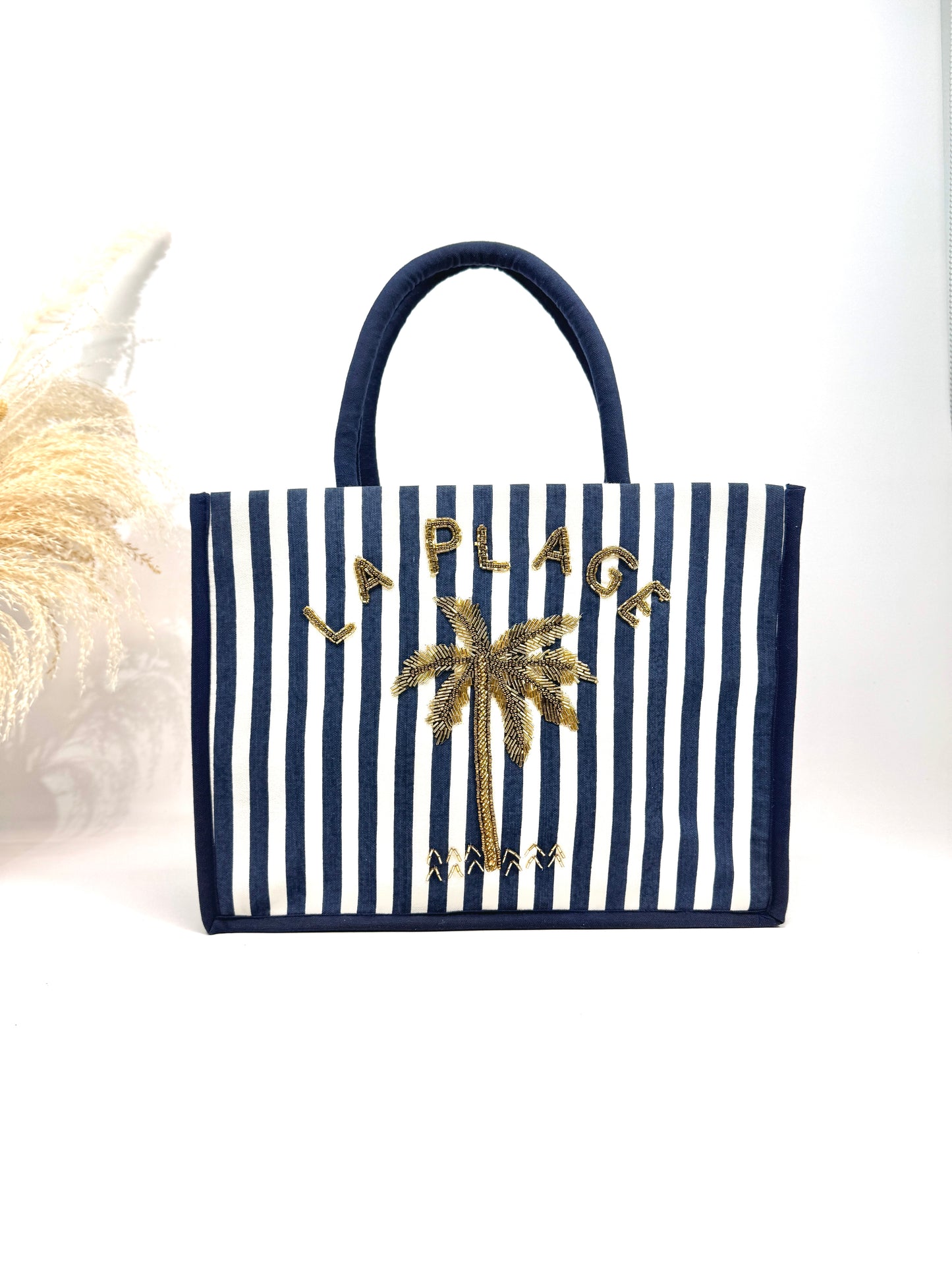 Le sac cabas "La plage" toile rayée et palmier