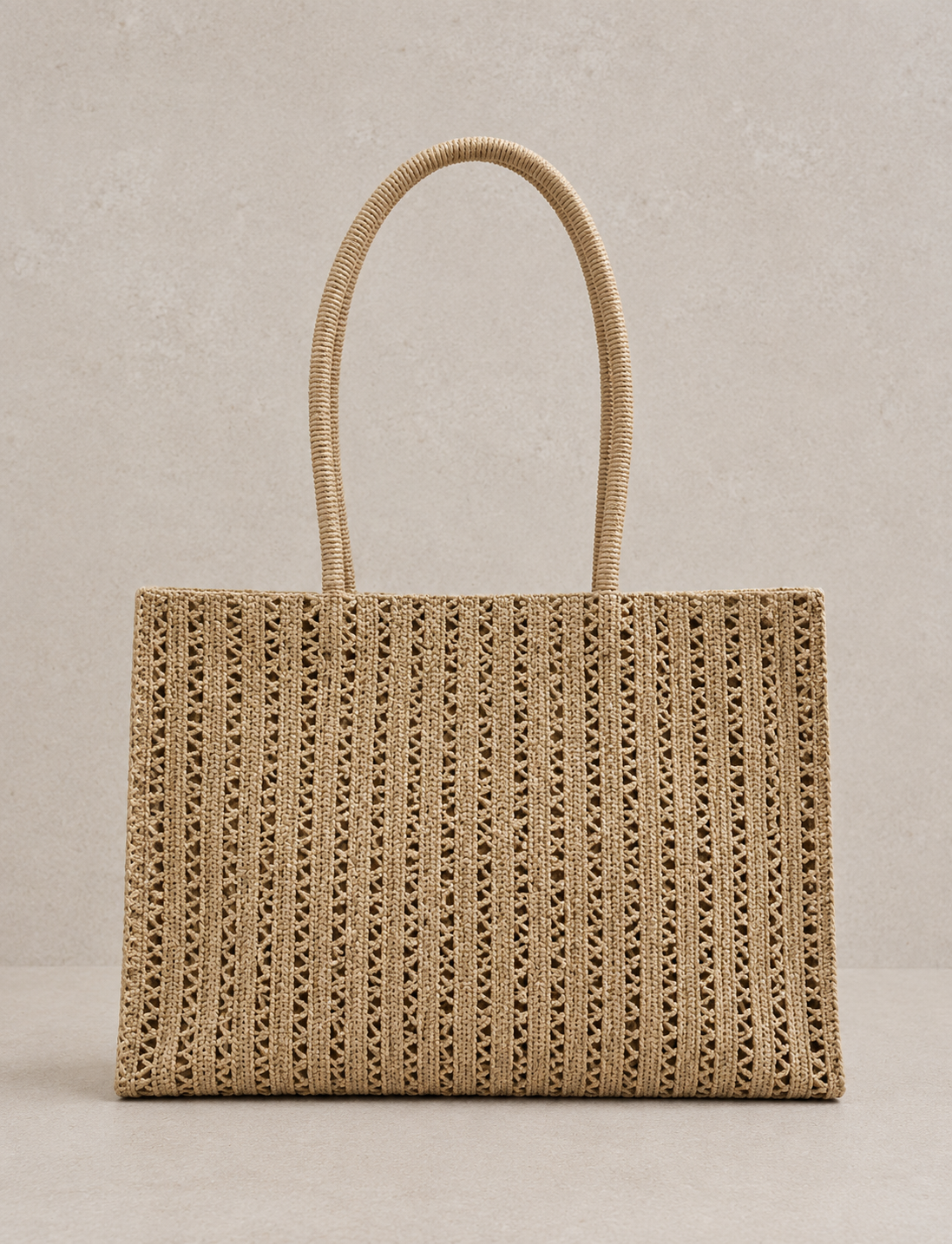 Sac cabas tressé à finitions dorées éclat solaire