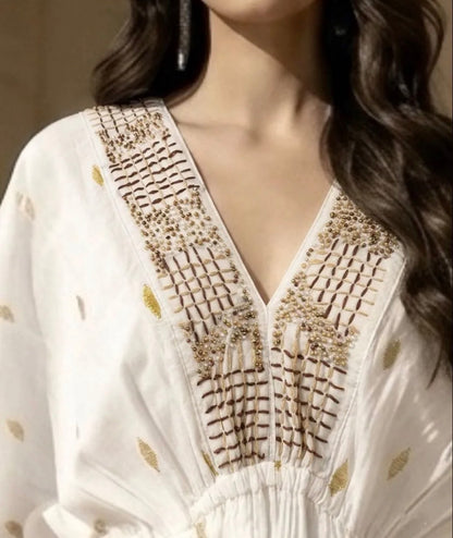 Robe coton à broderies dorées