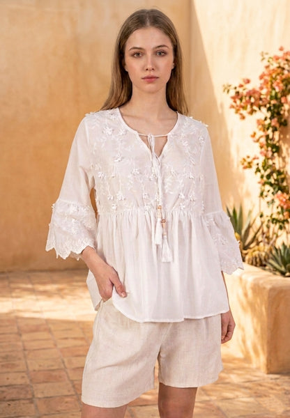 Blouse coton à pompons