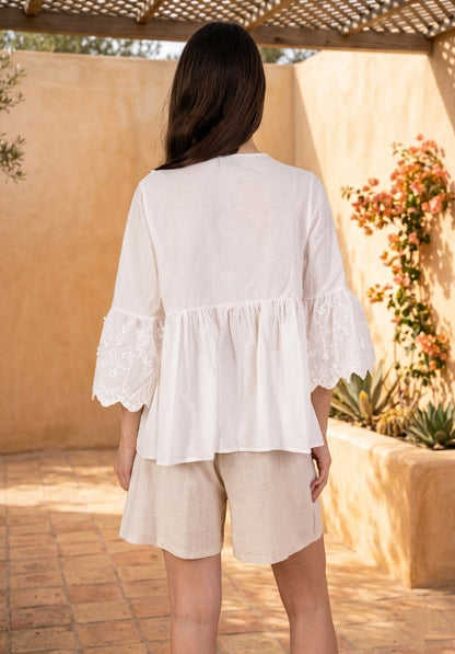 Blouse coton à pompons